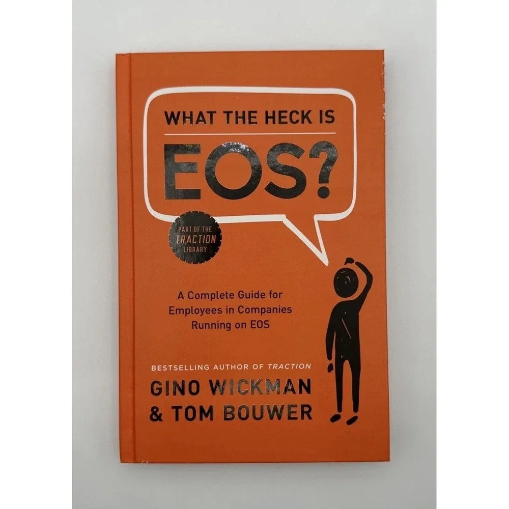 What The Heck Is EOS? Gino Wickman Tom Bouwer Business Hardcover Book Traction